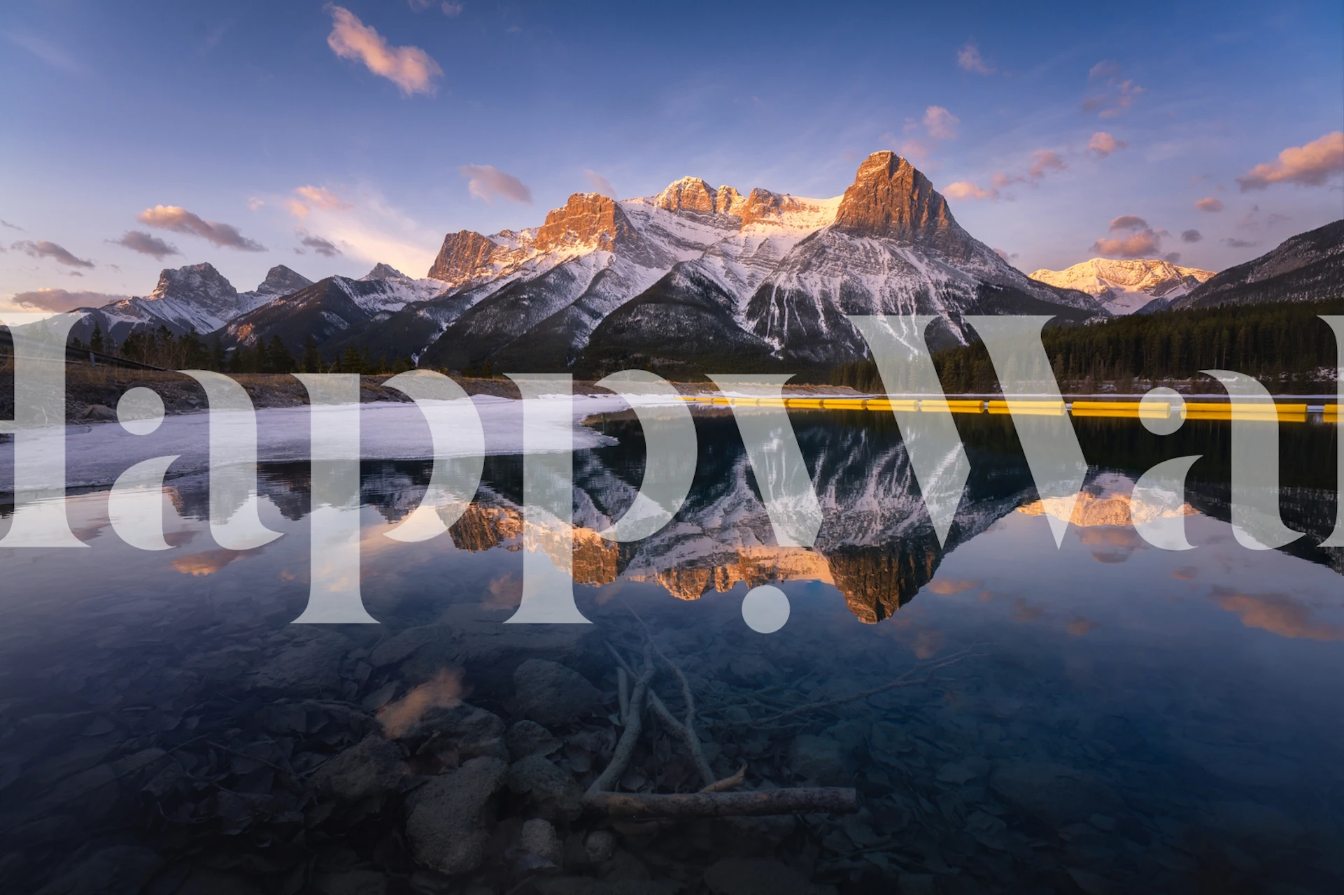 Majestic mountain reflections on still water at dawn wallpaper