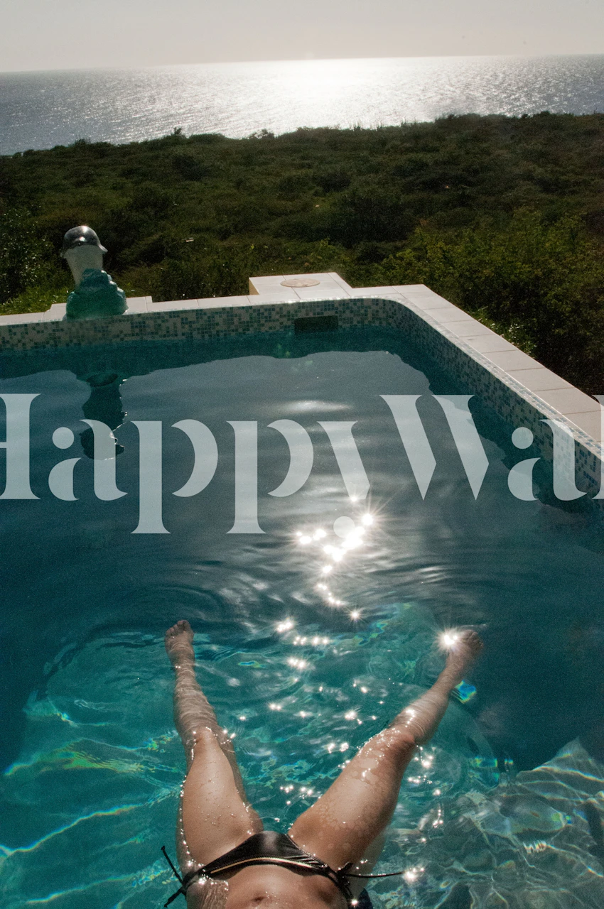 Woman relaxing in a pool
