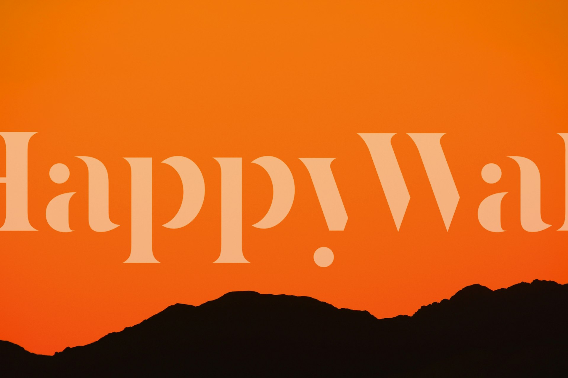 Sunset over Eilat mountains wallpaper in a room