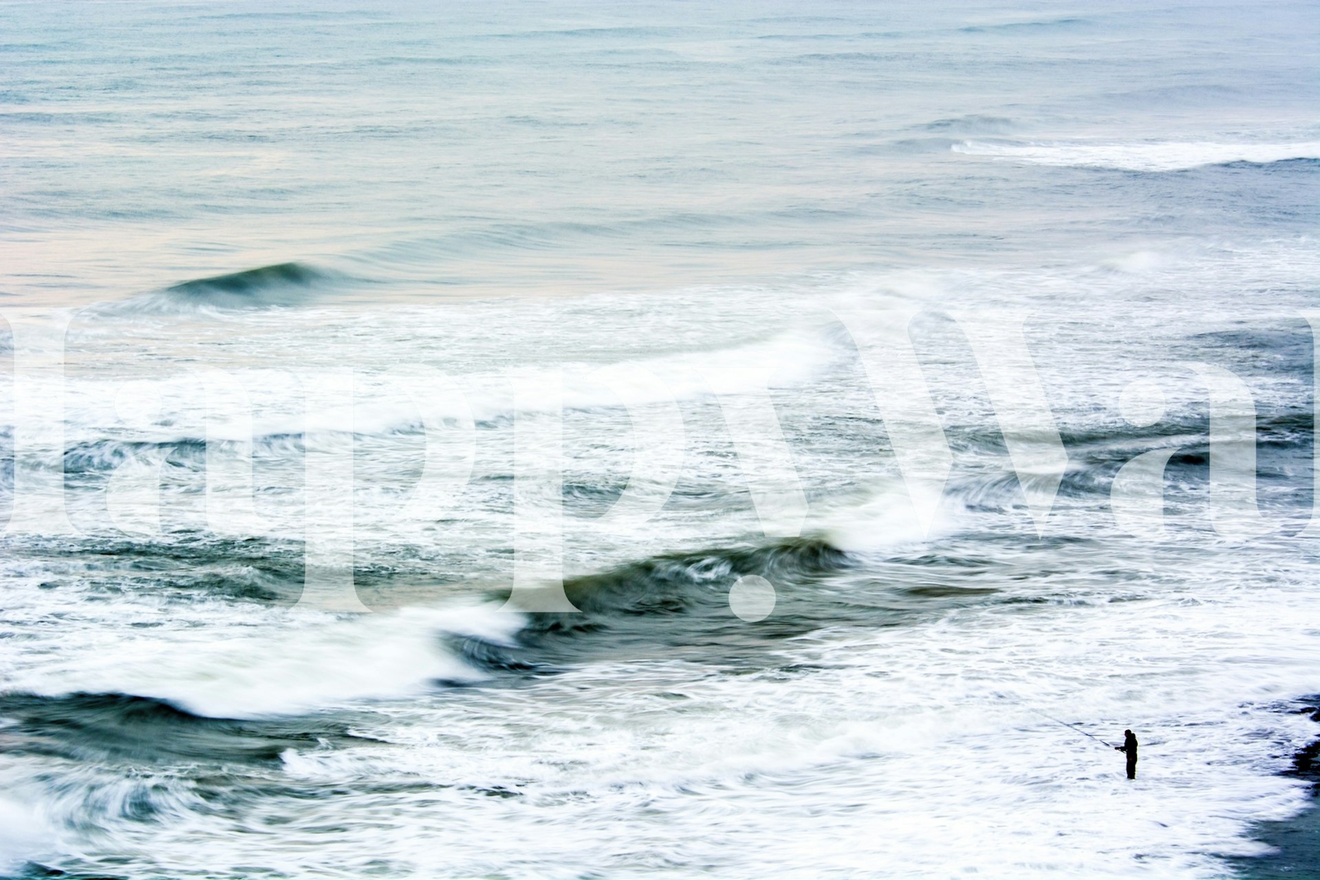 Fisherman by the ocean waves in soft muted colors wallpaper