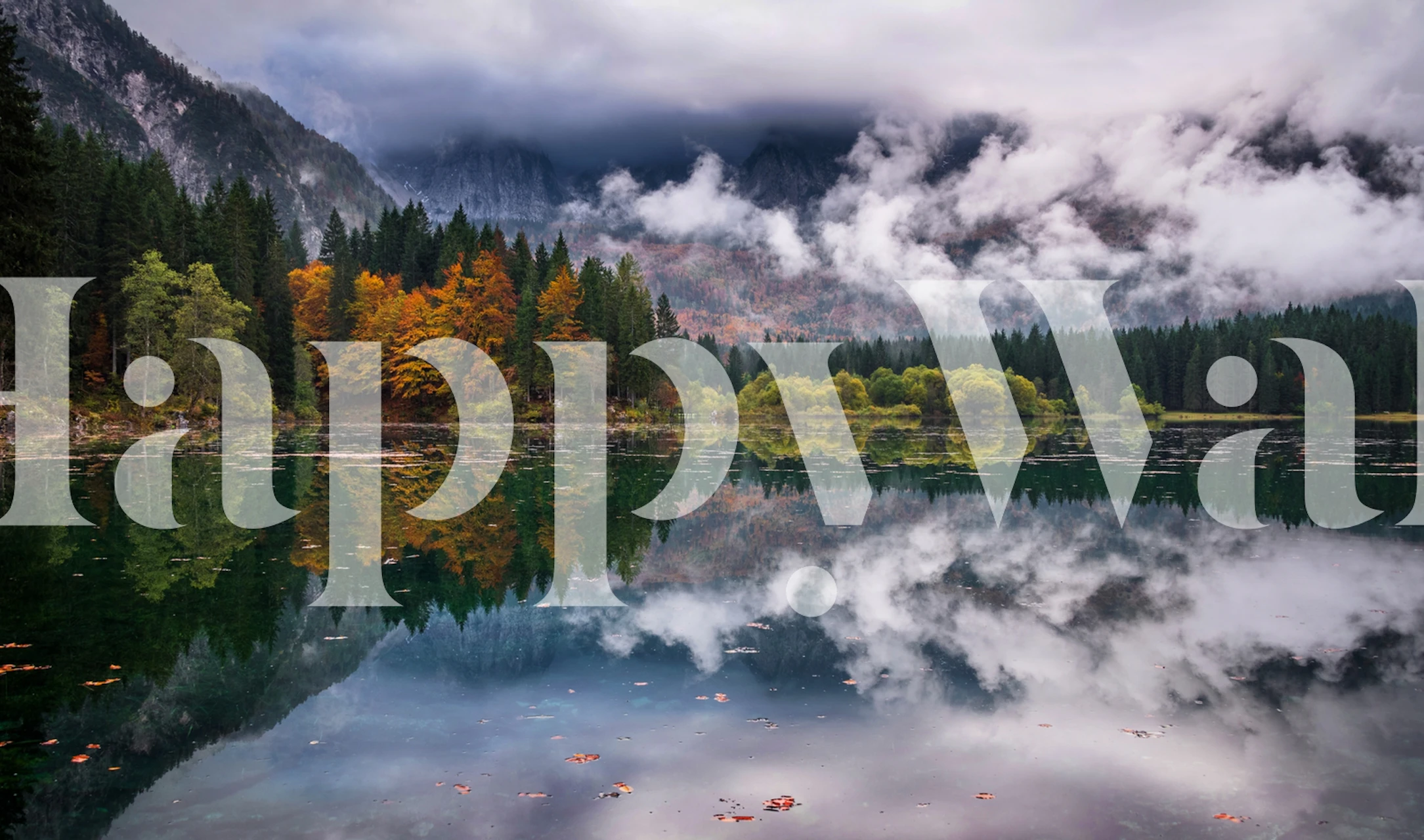Fusine Lake wall mural showing autumn trees and mountains reflected in calm water