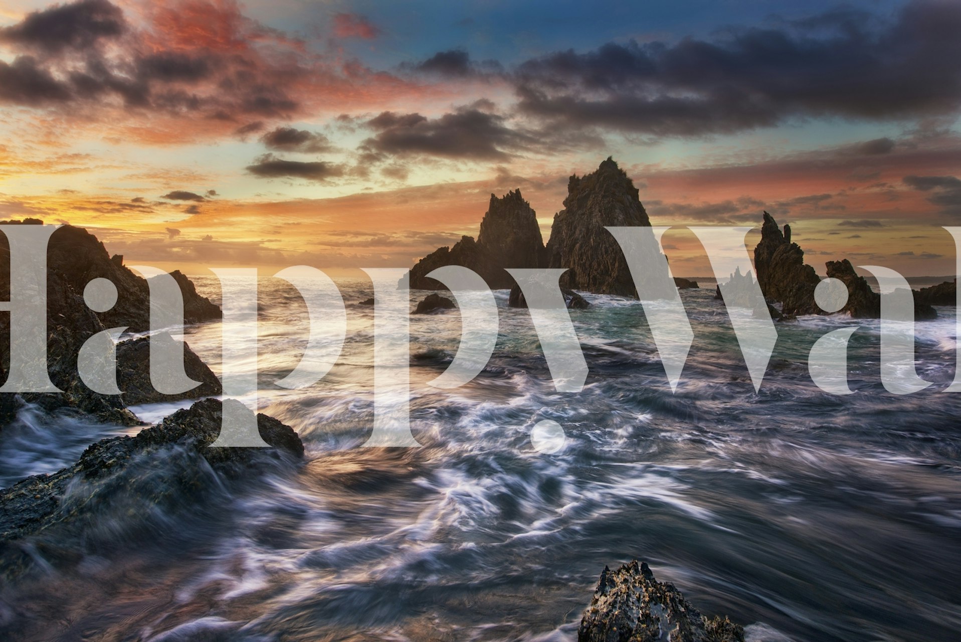 Sunset over ocean rocks wallpaper in vibrant colors and textures