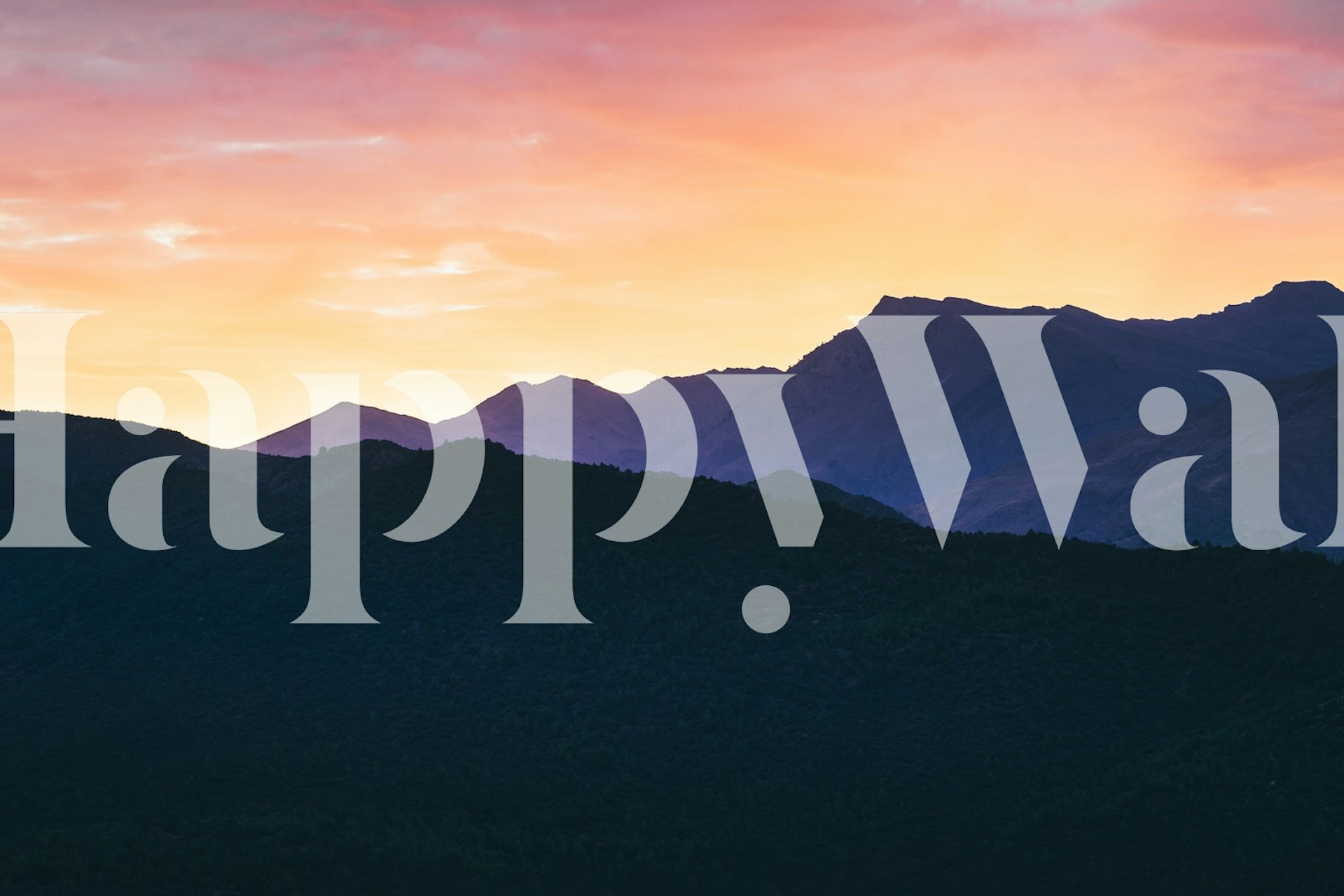 Mountain landscape silhouette with purple, orange, and pink hues wallpaper