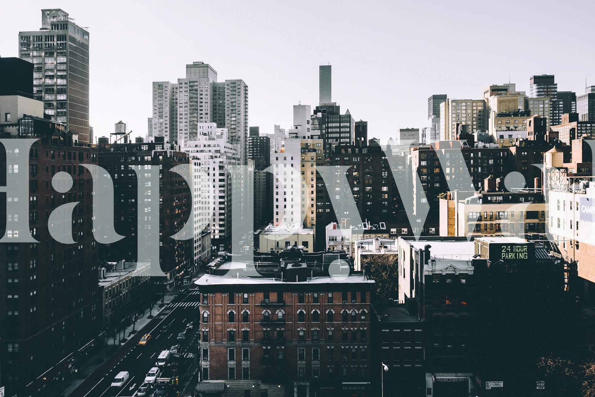 Cityscape of buildings in muted tones wallpaper