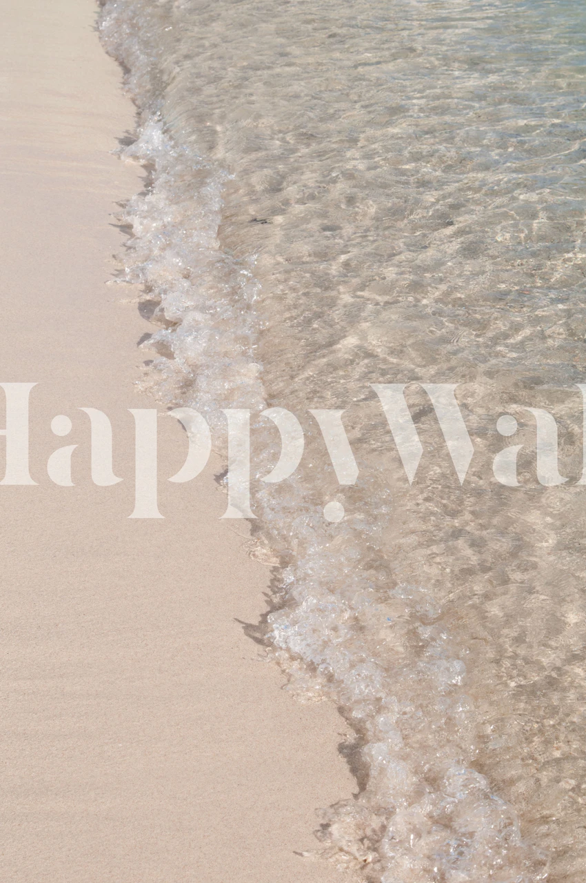 Beach shoreline with clear water and sand wallpaper