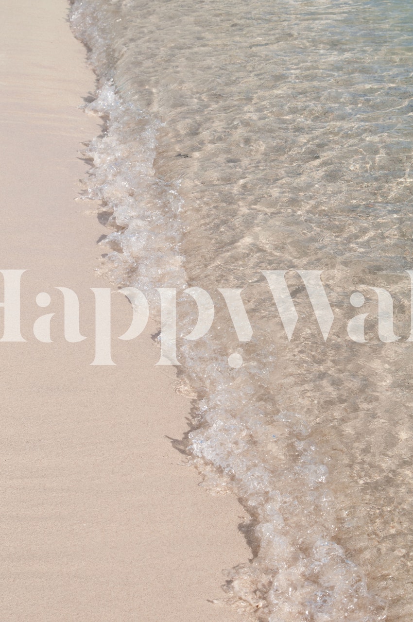 Beach shoreline with clear water and sand wallpaper