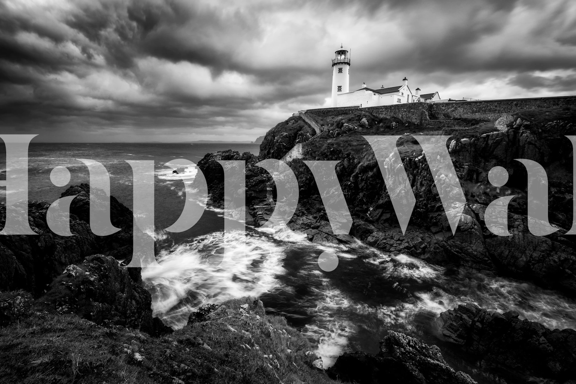 Black and white lighthouse wallpaper in a room