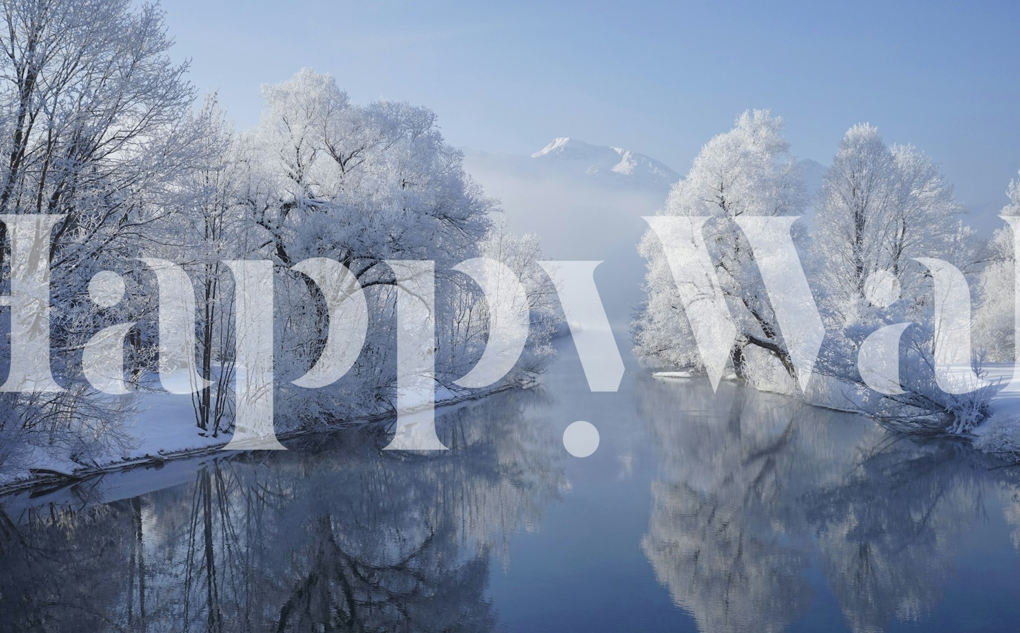 Frosted winter landscape with icy trees and a calm river wallpaper