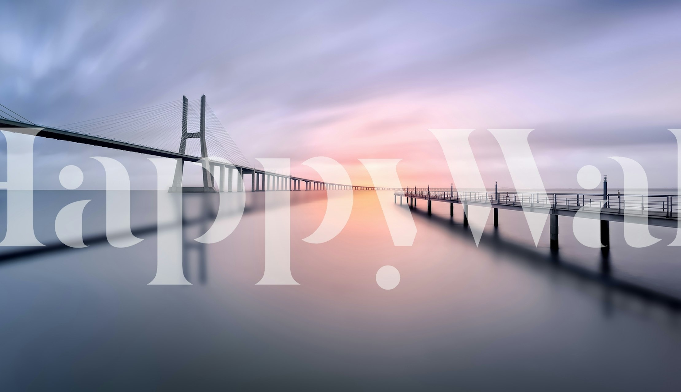 Vasco de Gama Bridge at sunset over calm waters wallpaper