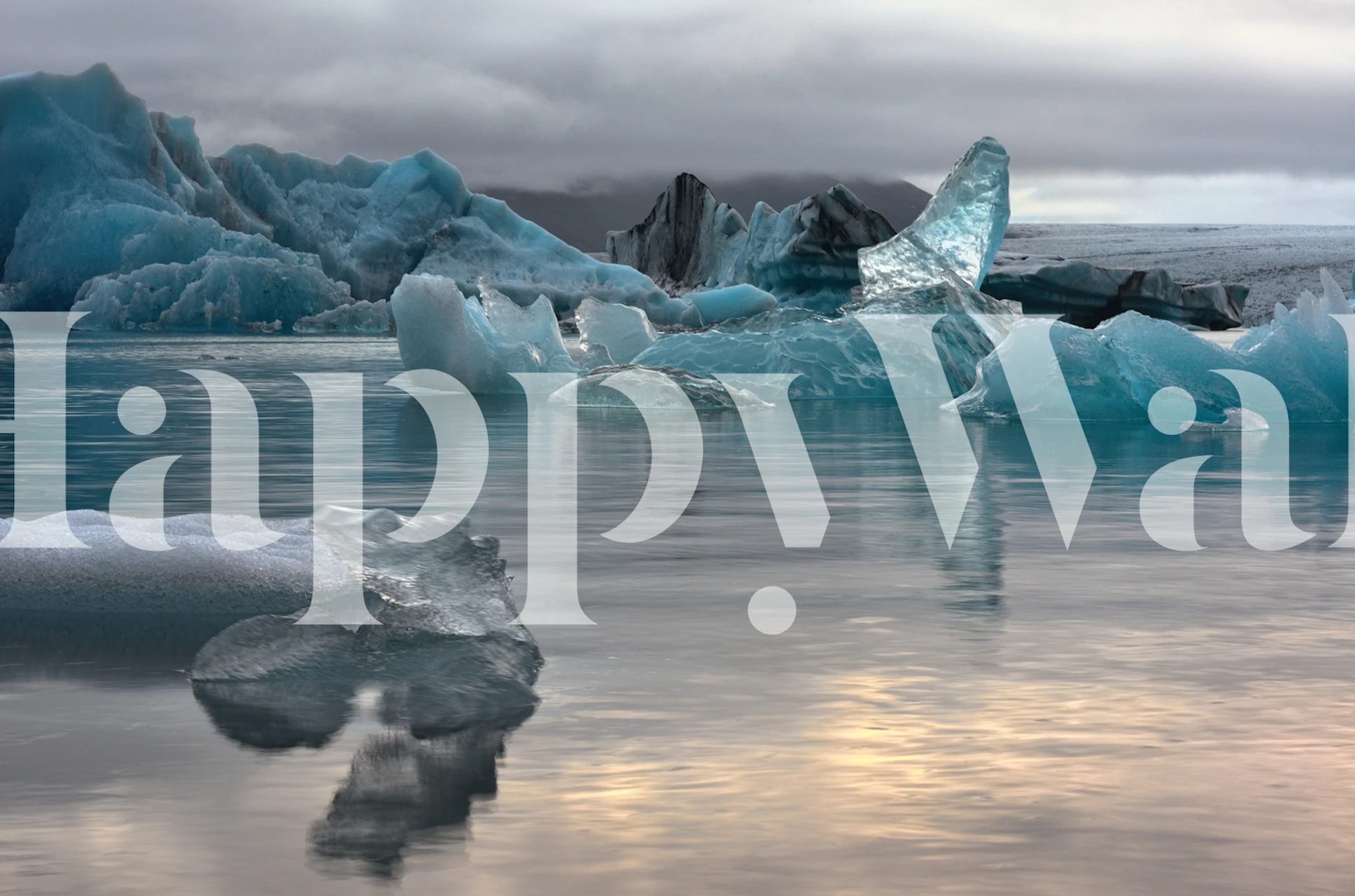 Iceberg wall mural with calm water reflecting a soft sky