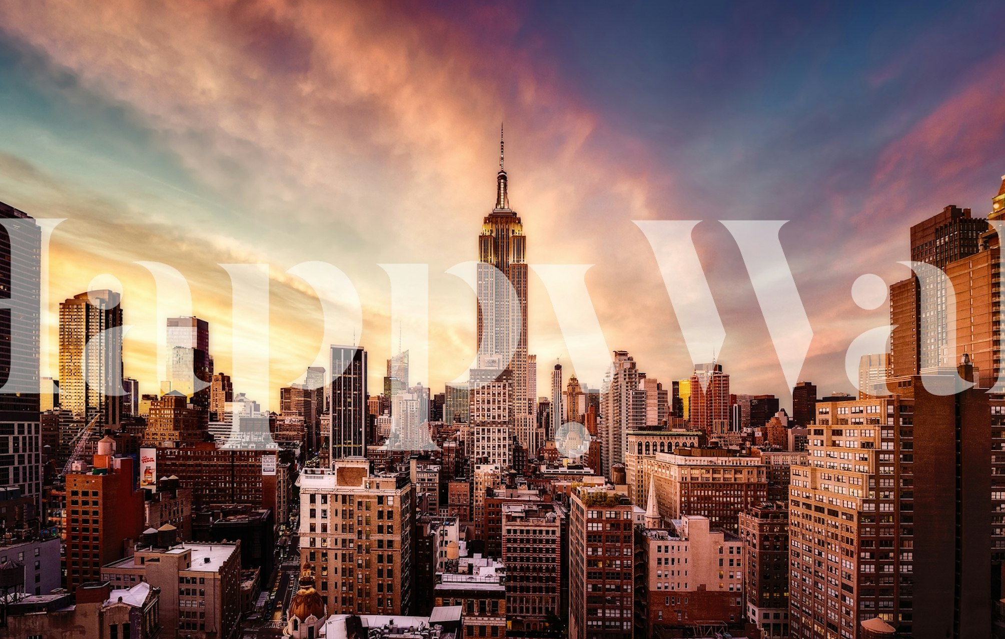 City skyline at sunset with purple and orange hues wallpaper