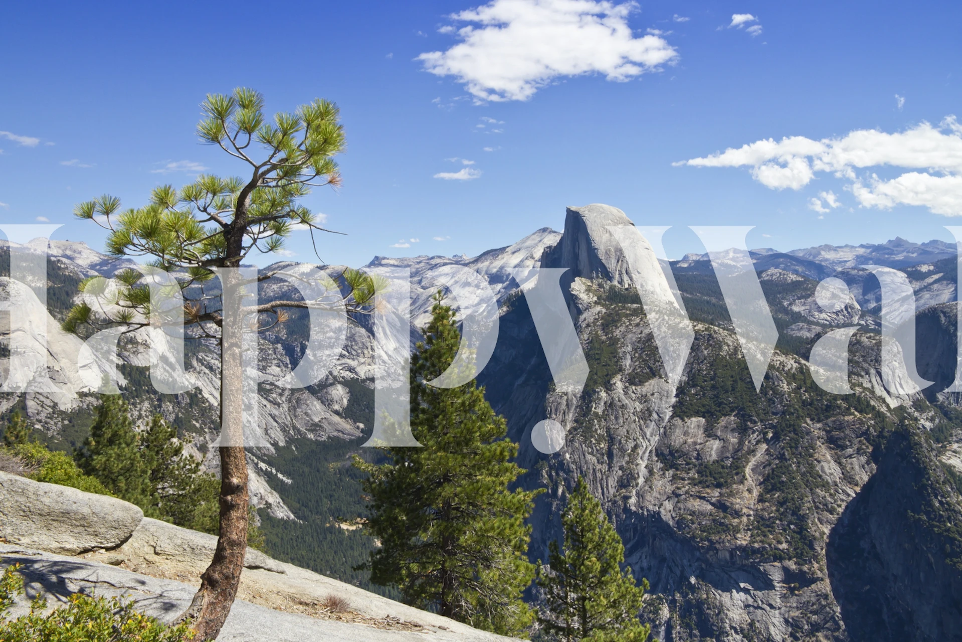 Yosemite Valley landscape featuring mountains and blue sky wallpaper