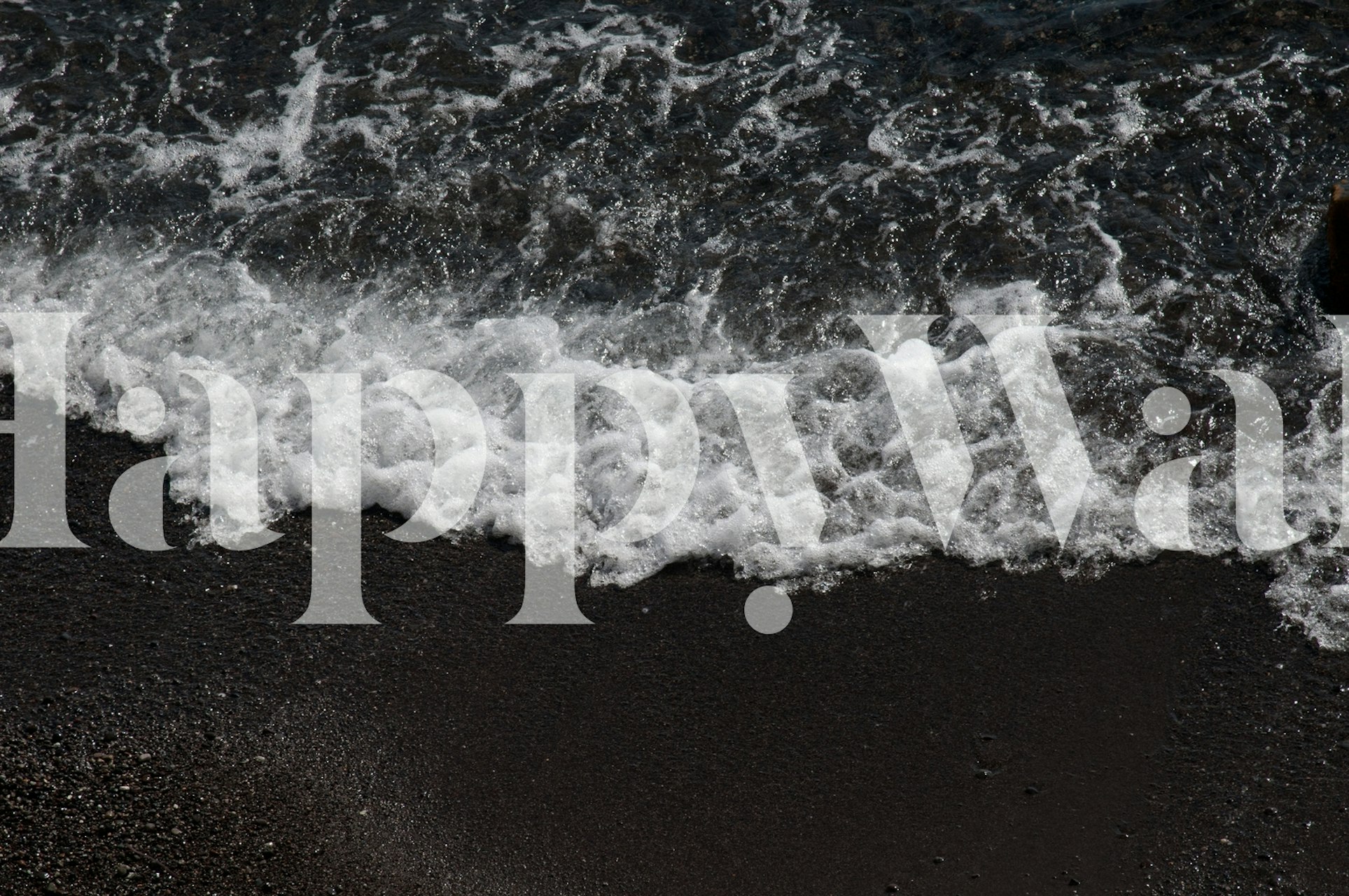 Ocean waves crashing on dark beach wallpaper