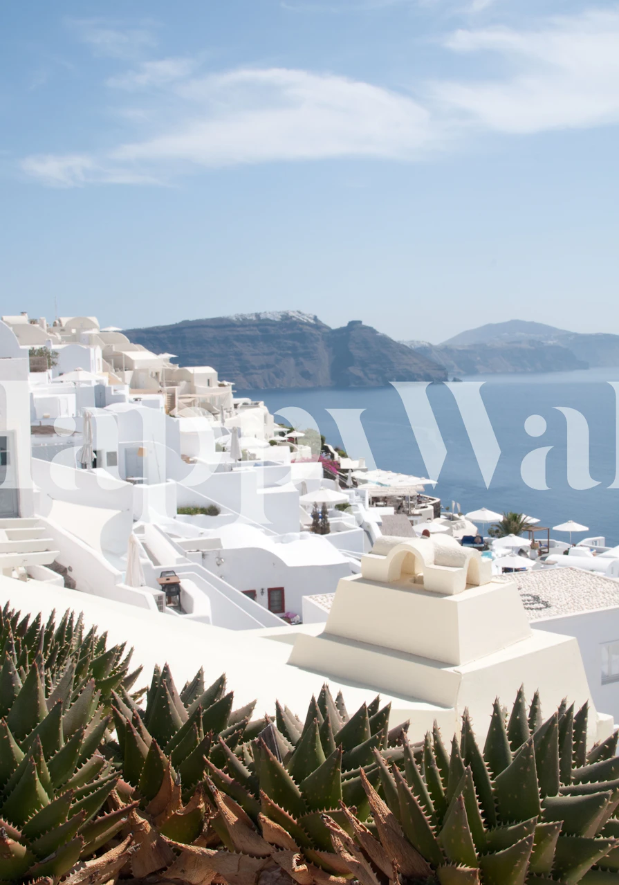 Aerial view of Santorini with white architecture and blue sea wallpaper