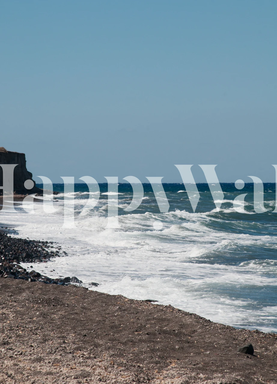Seascape with blue ocean waves and brown rocky shore wallpaper