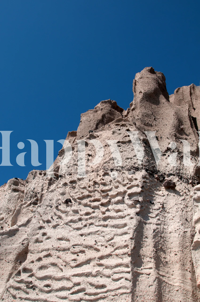 Santorini volcanic cliff wall mural with textured earthy tones