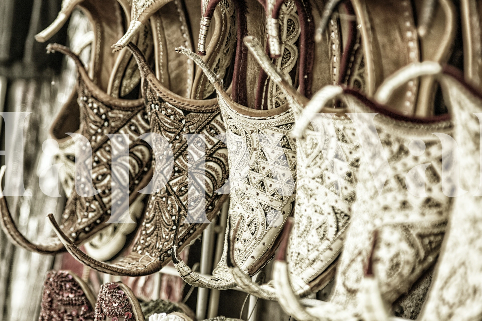 Intricate patterned wallpaper featuring earthy tones and detailed designs