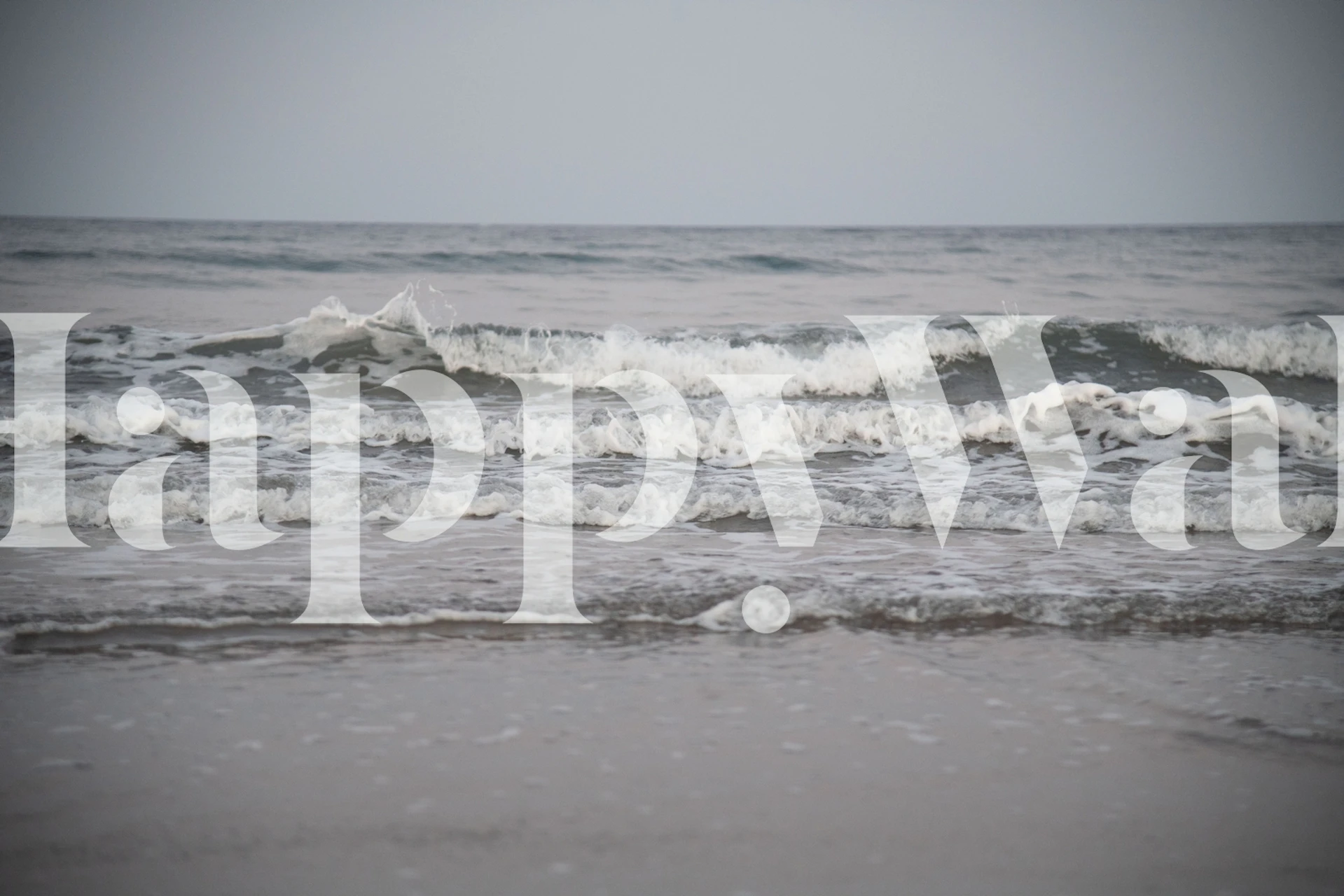 Wallpaper featuring ocean waves in a room