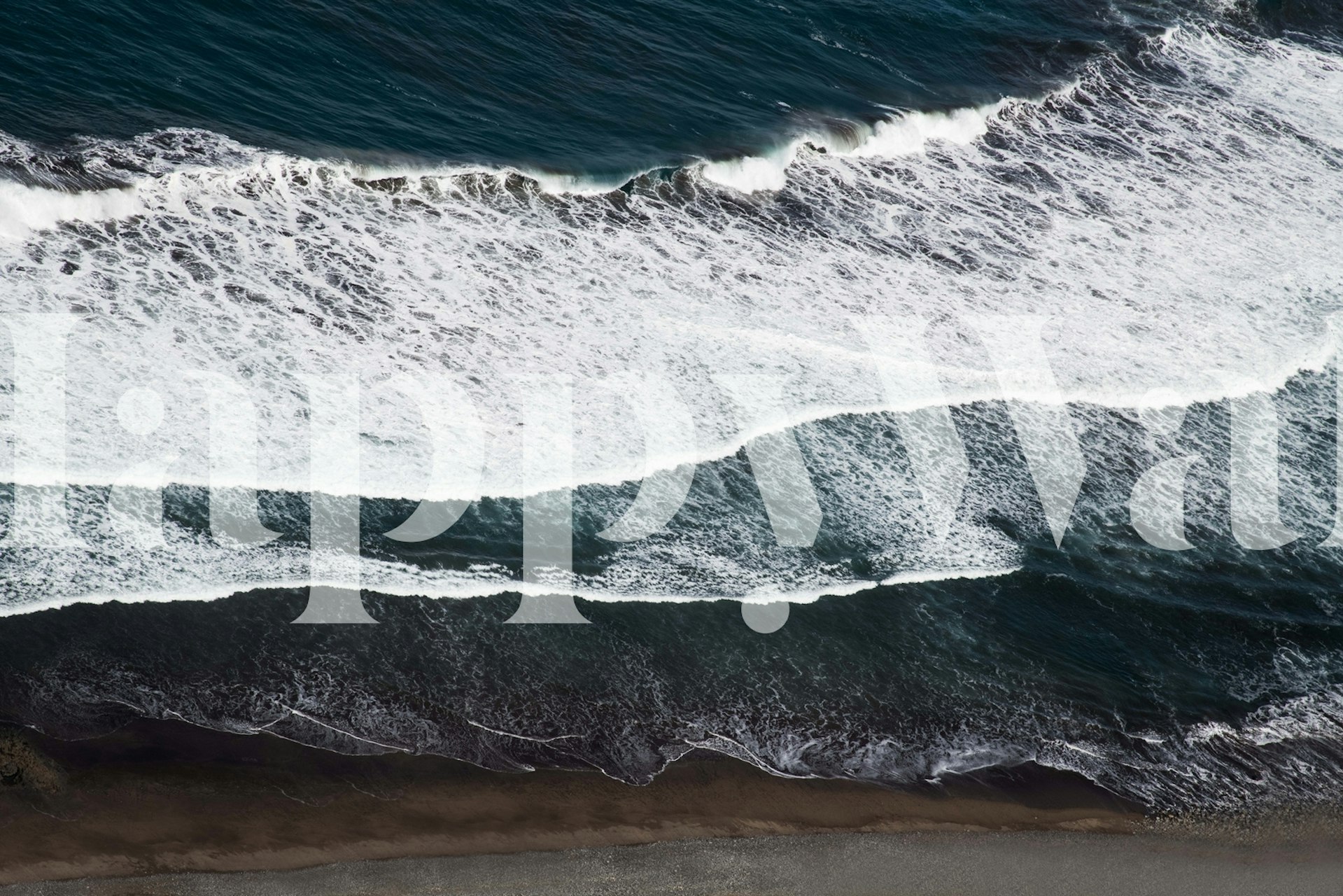 Ocean waves on a dark shore, blue and white colors, photographic wallpaper