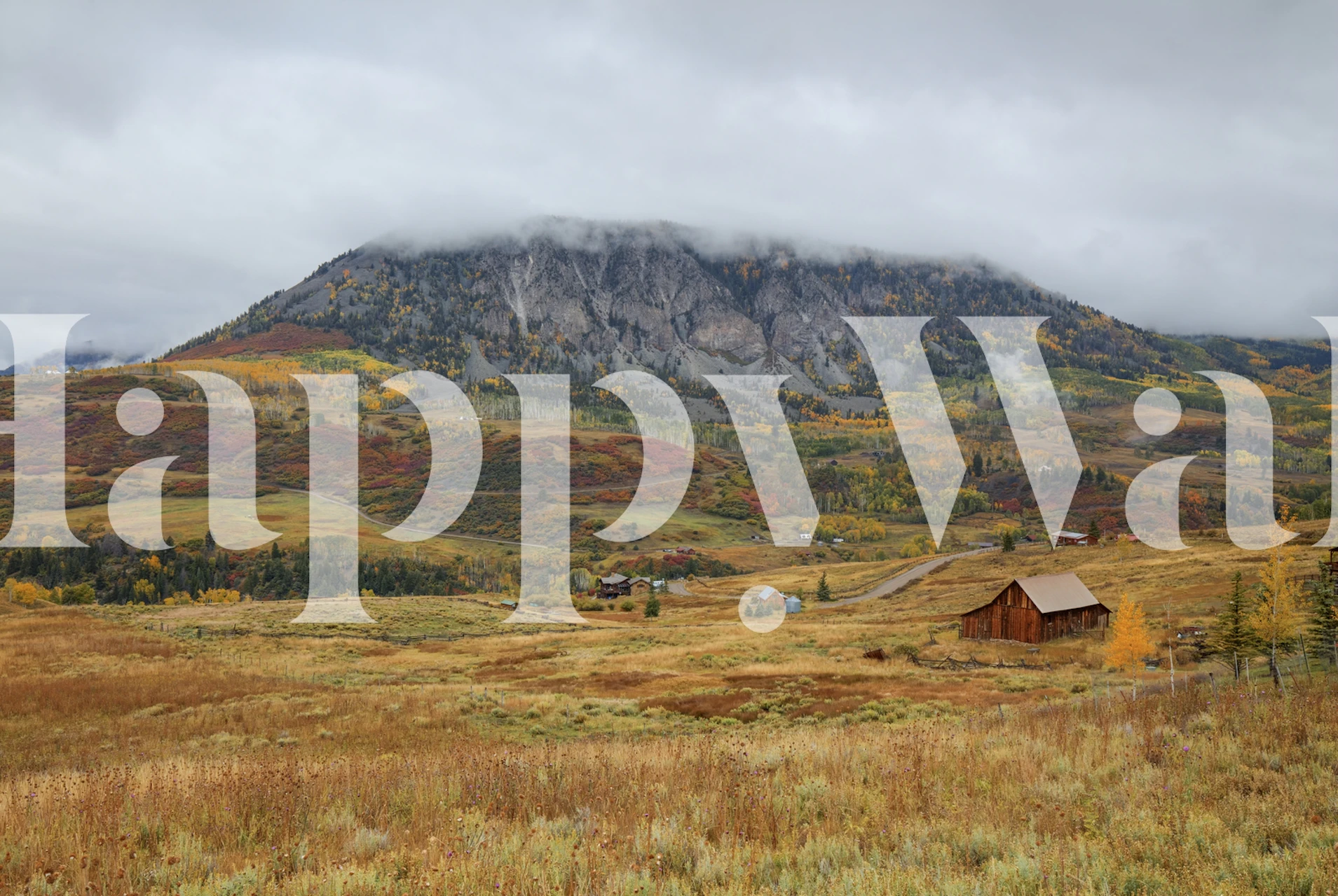 Beautiful autumn barn scene with mountains and colorful foliage wallpaper