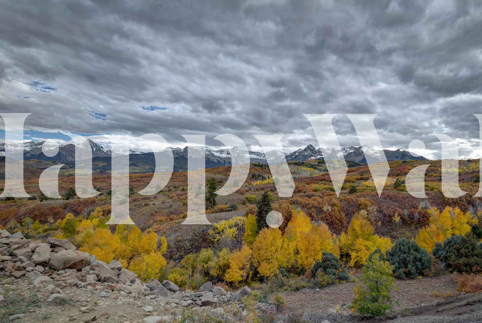 Mountain landscape with autumn trees in yellow and gray wallpaper