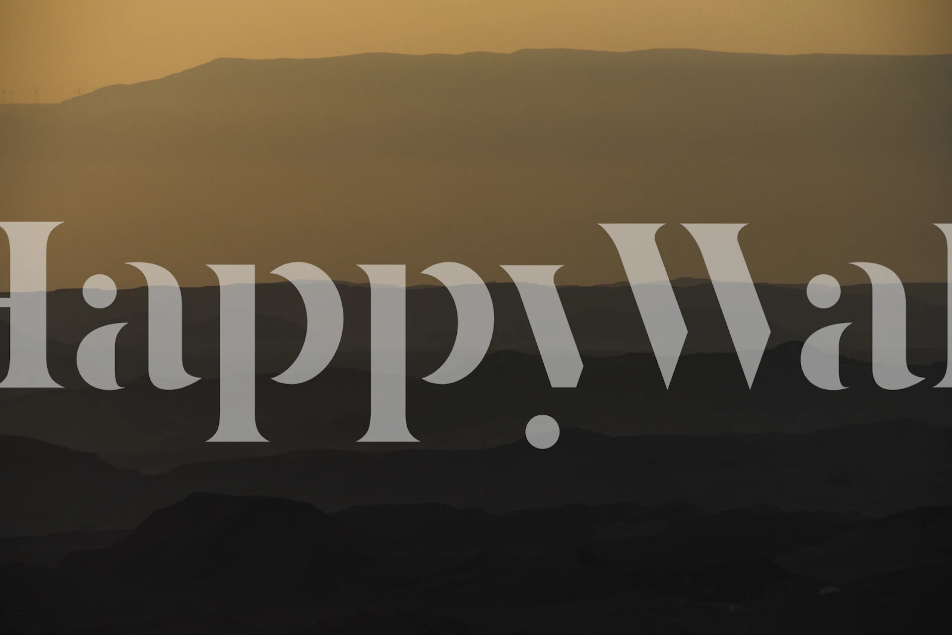 Desert sunrise wall mural depicting the tranquil scene of morning light over Ramon Crater's landscape