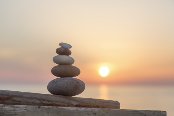 Sunset Seaside Stone Cairn