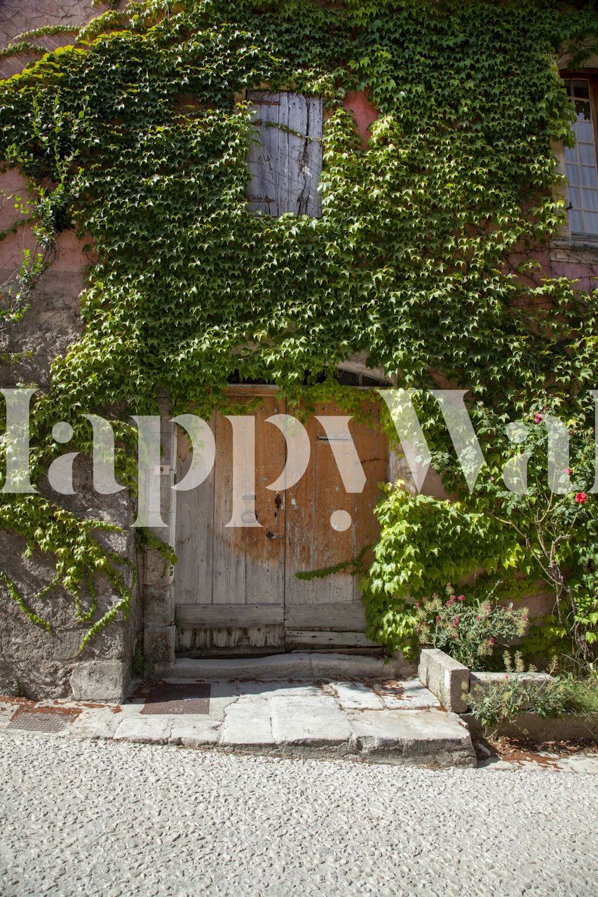 Vintage door surrounded by greenery wallpaper