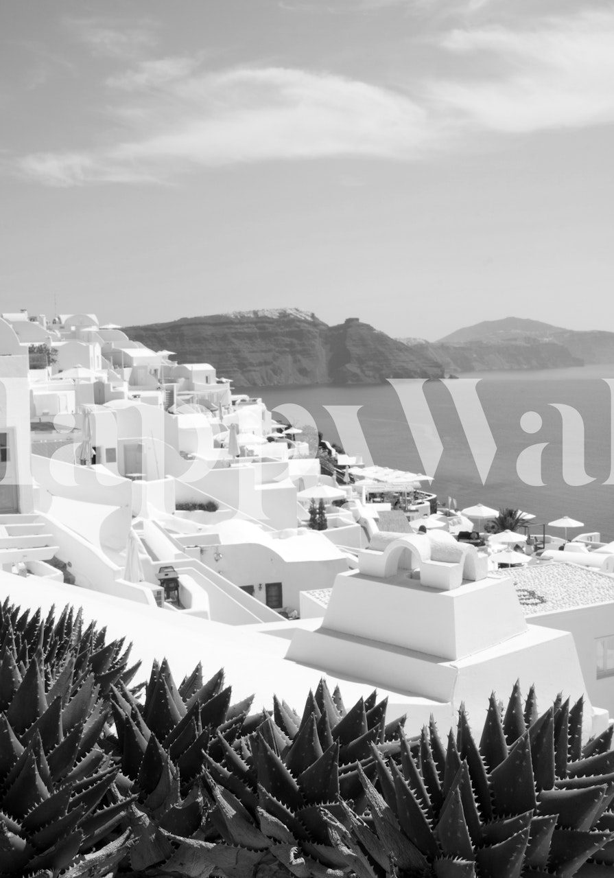 Sort og hvid Santorini Oia-tapet i et rum
