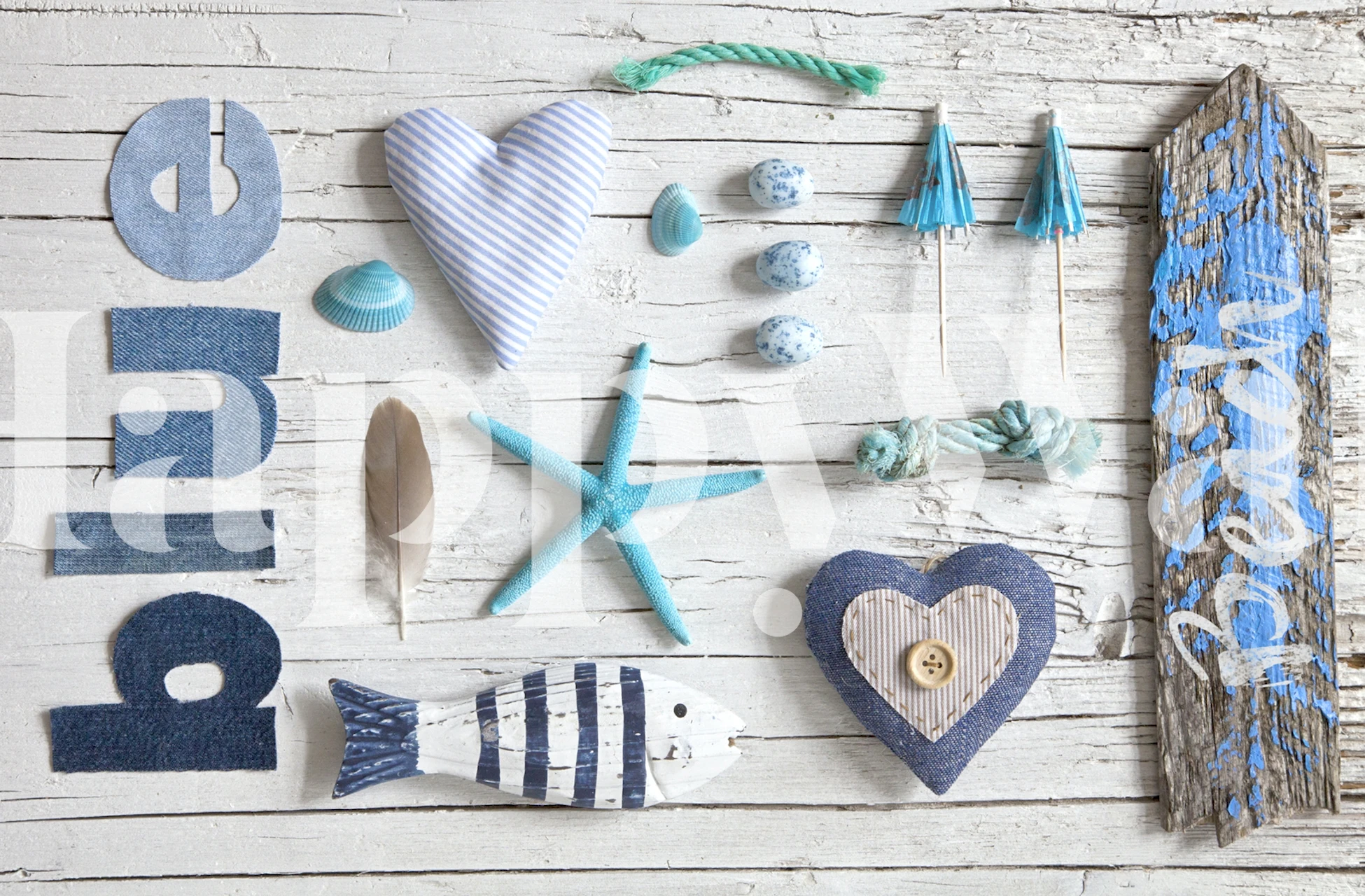 Decorative coastal elements: blue heart, fish, starfish, and seashells on weathered wood background wallpaper