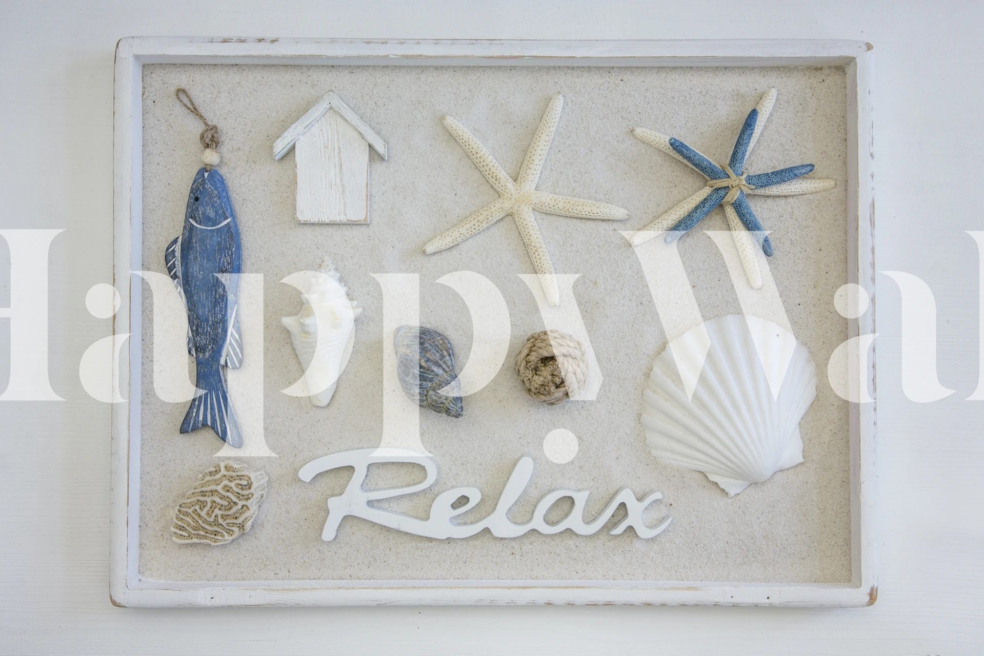 Coastal flat lay display with seashells and fish