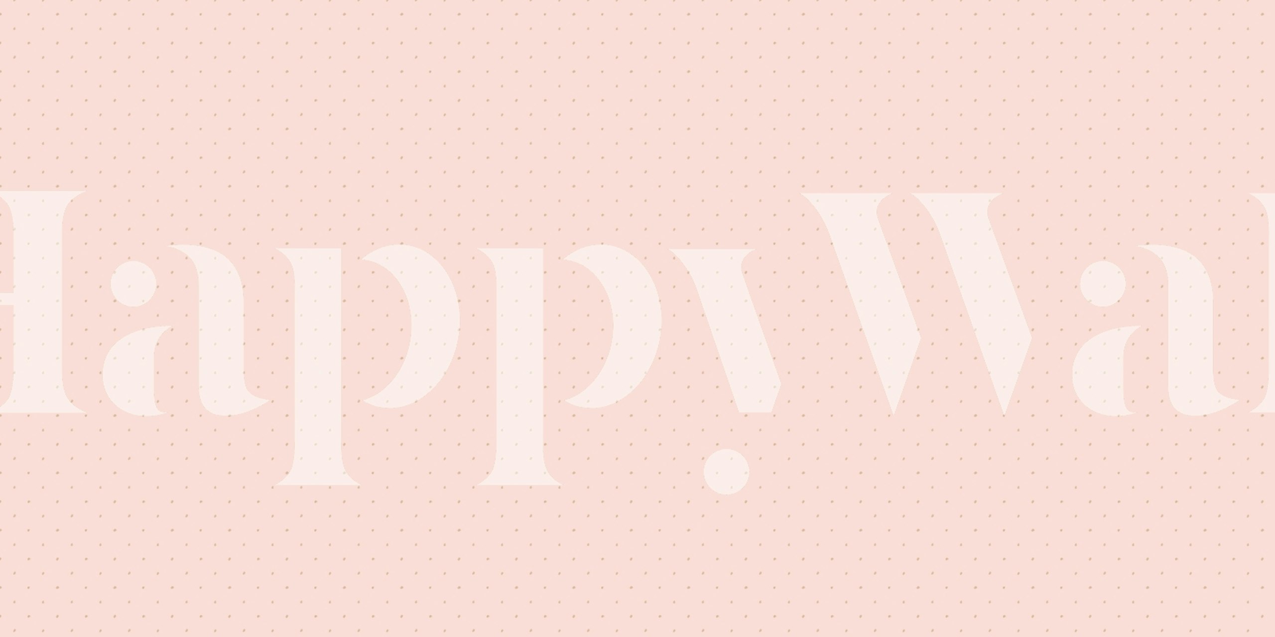 Trendy beige and pink polka dot wallpaper for stylish decor