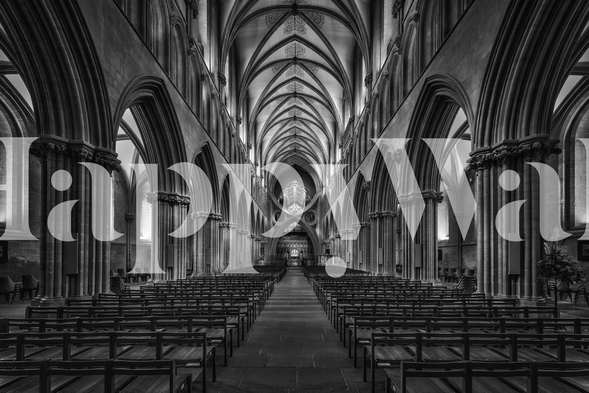 Mural de parede interior da Catedral de Wells em preto e branco apresentando detalhes arquitetônicos góticos.