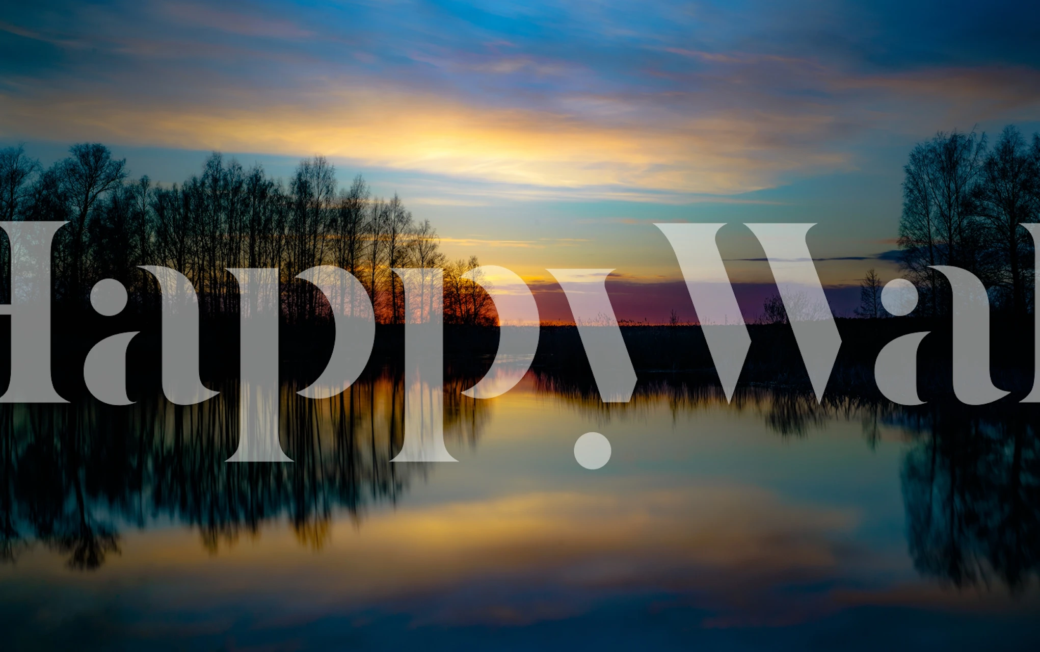 Mural de pared de una tranquila puesta de sol en un lago con colores vibrantes y siluetas de árboles