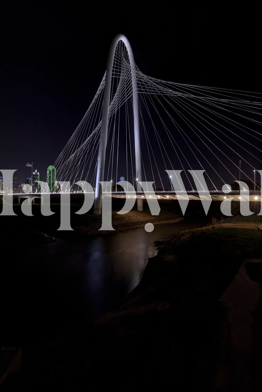 Nighttime view of Margaret Hunt Hill Bridge with city lights wallpaper