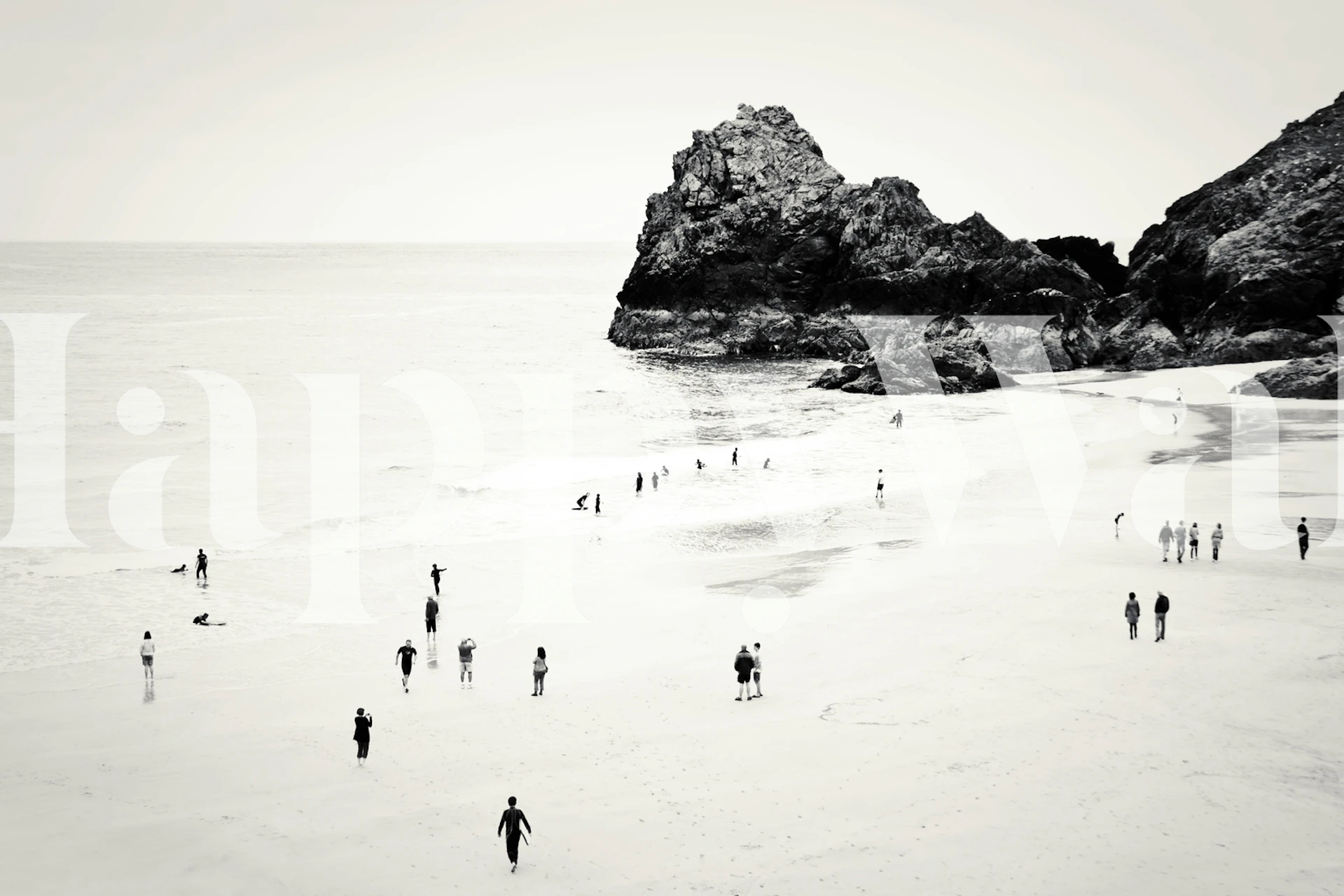 Monochrome beach scene wall mural with cliff and silhouettes of people