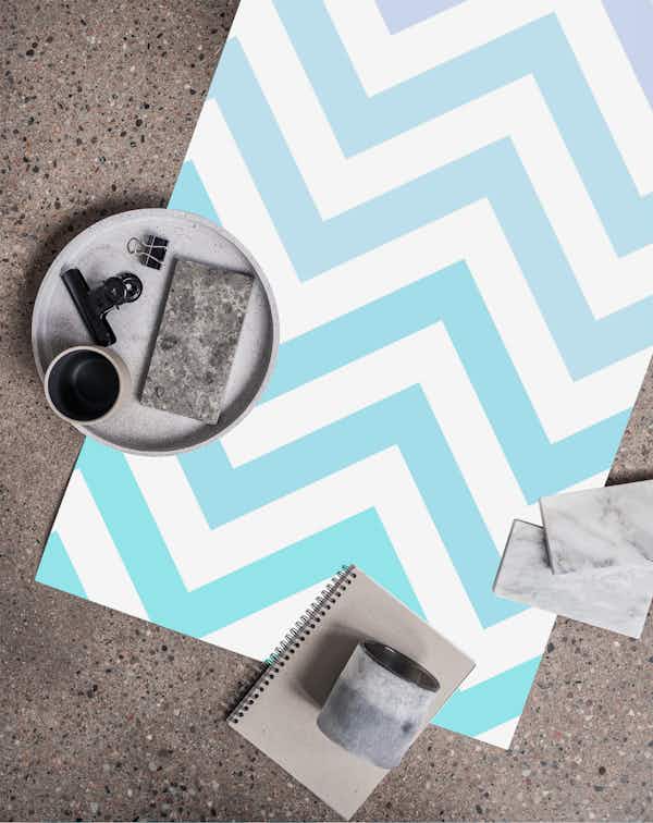 Blue chevron wallpaper roll