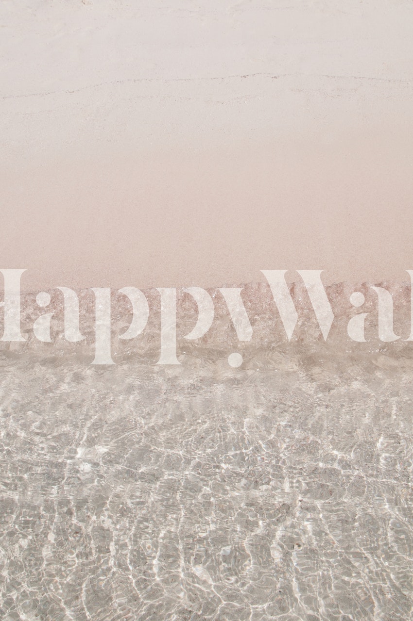 Sereno mural costero de una playa de arena que se fusiona con las aguas cristalinas del océano