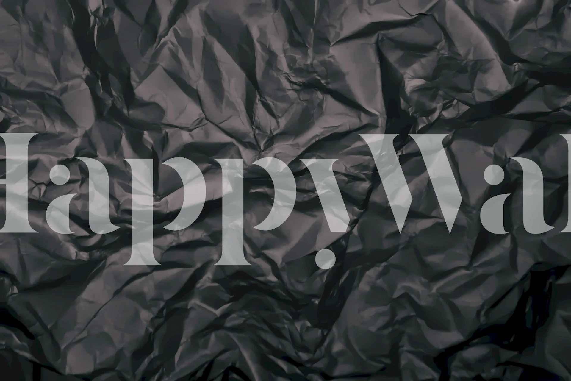 Abstrakcyjna czarna teksturowana fototapeta przedstawiająca miękkie cienie i światła.