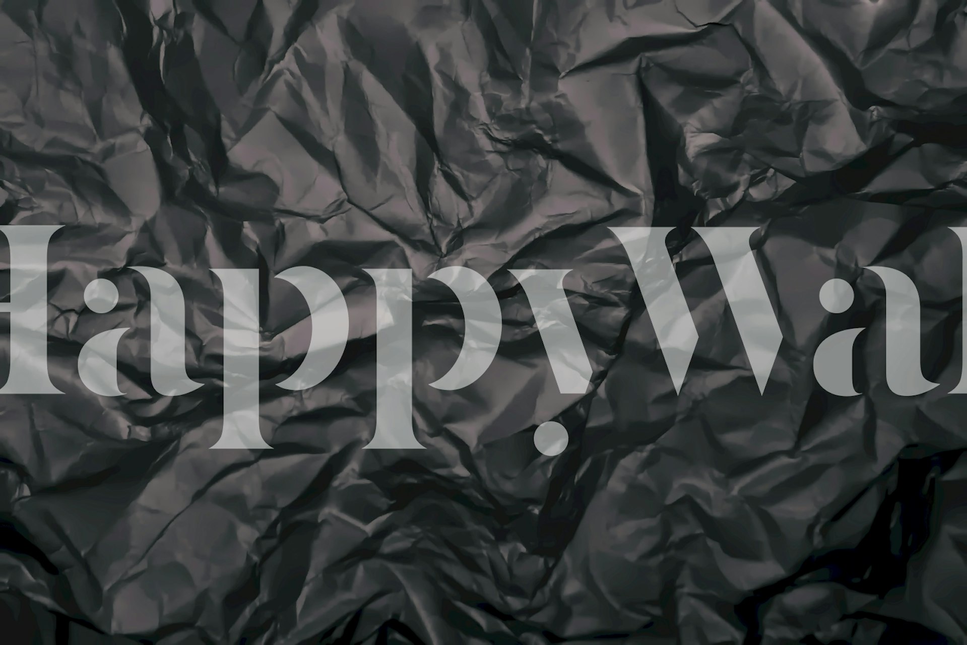 Abstract black textured wall mural depicting soft shadows and highlights.