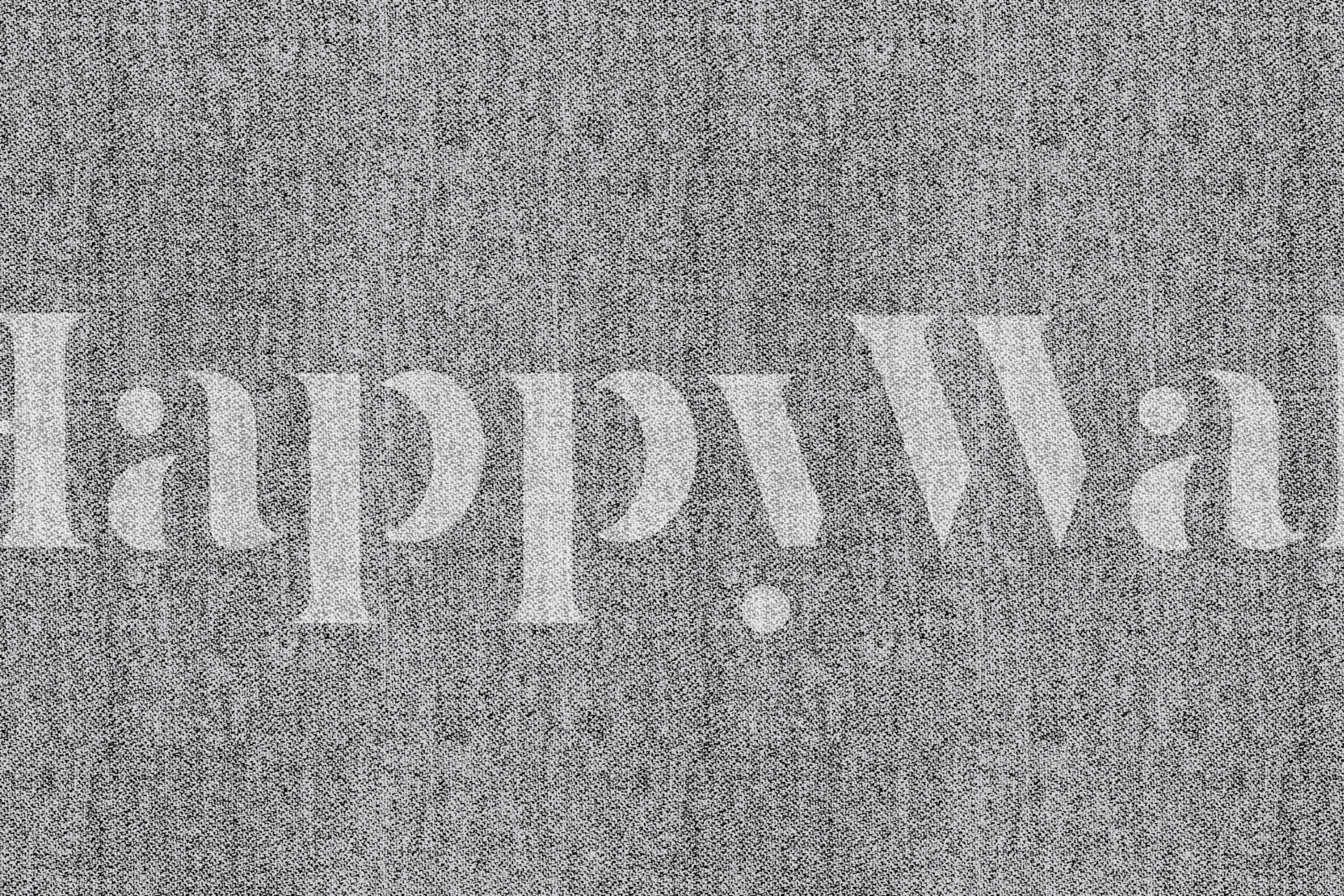 Greyish textile wallpaper in a room setting