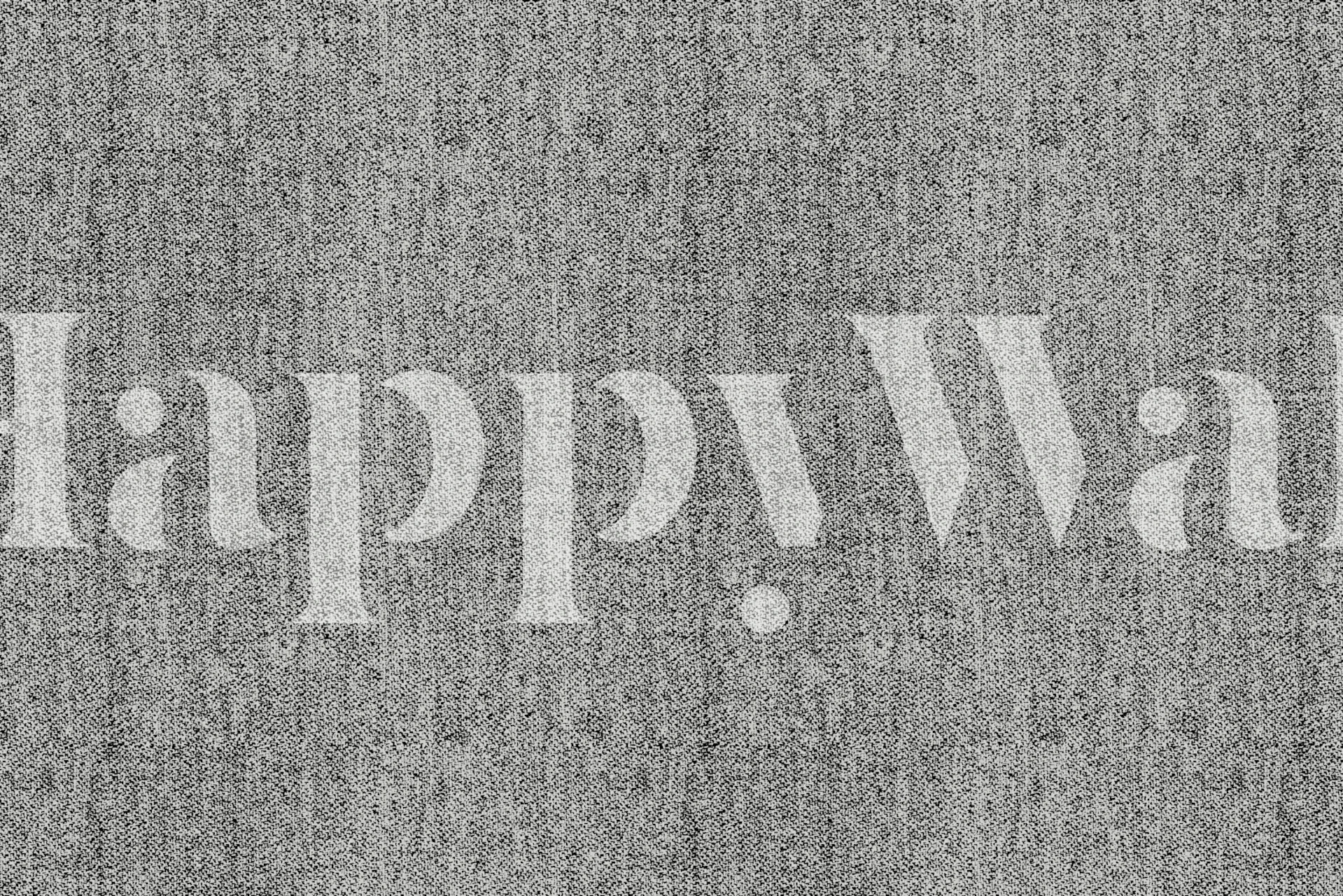 Greyish textile wallpaper in a room setting