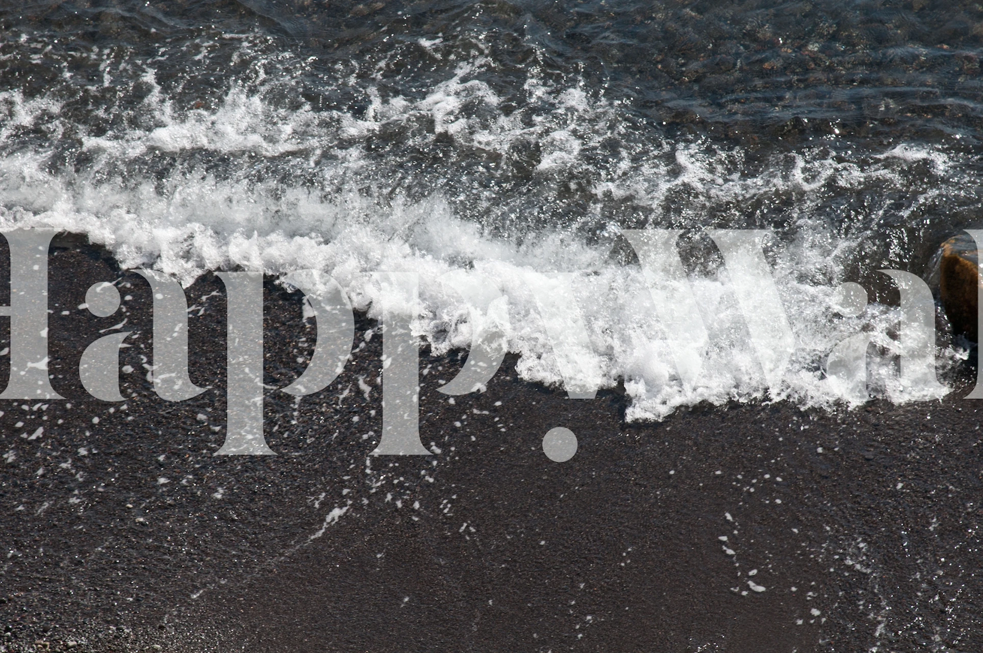 Ocean waves crashing on a dark shore wallpaper