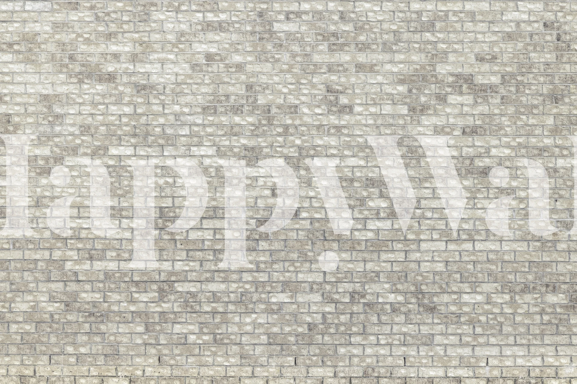 Gray brick pattern wallpaper in muted tones