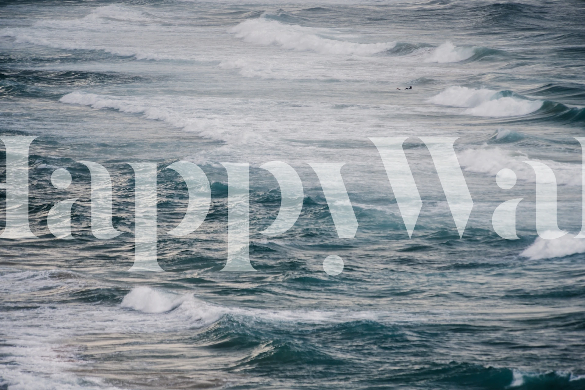 Ocean waves in varying shades of blue and white wallpaper