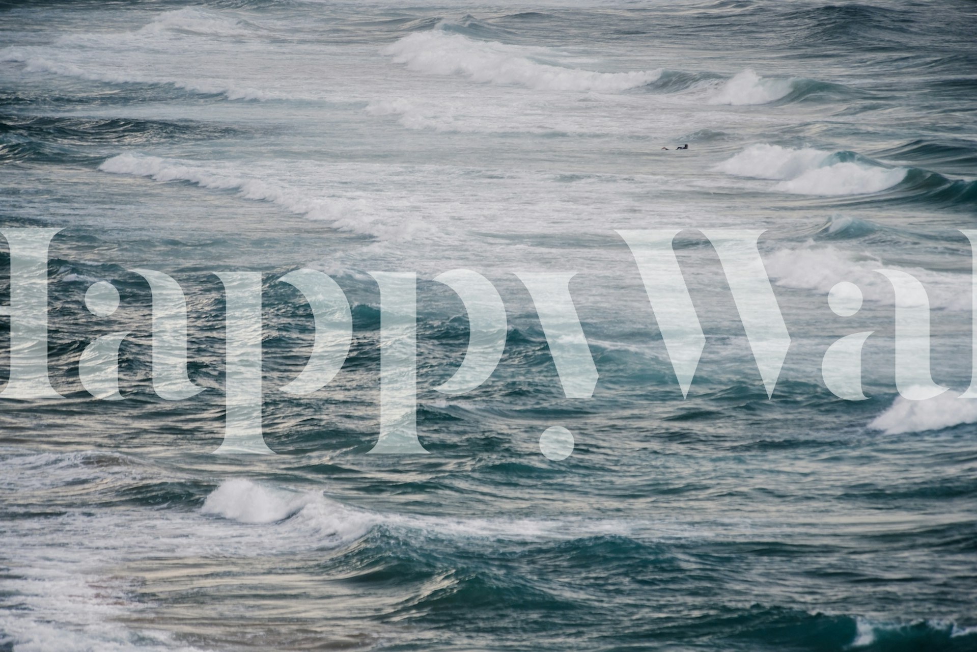 Ocean waves in varying shades of blue and white wallpaper