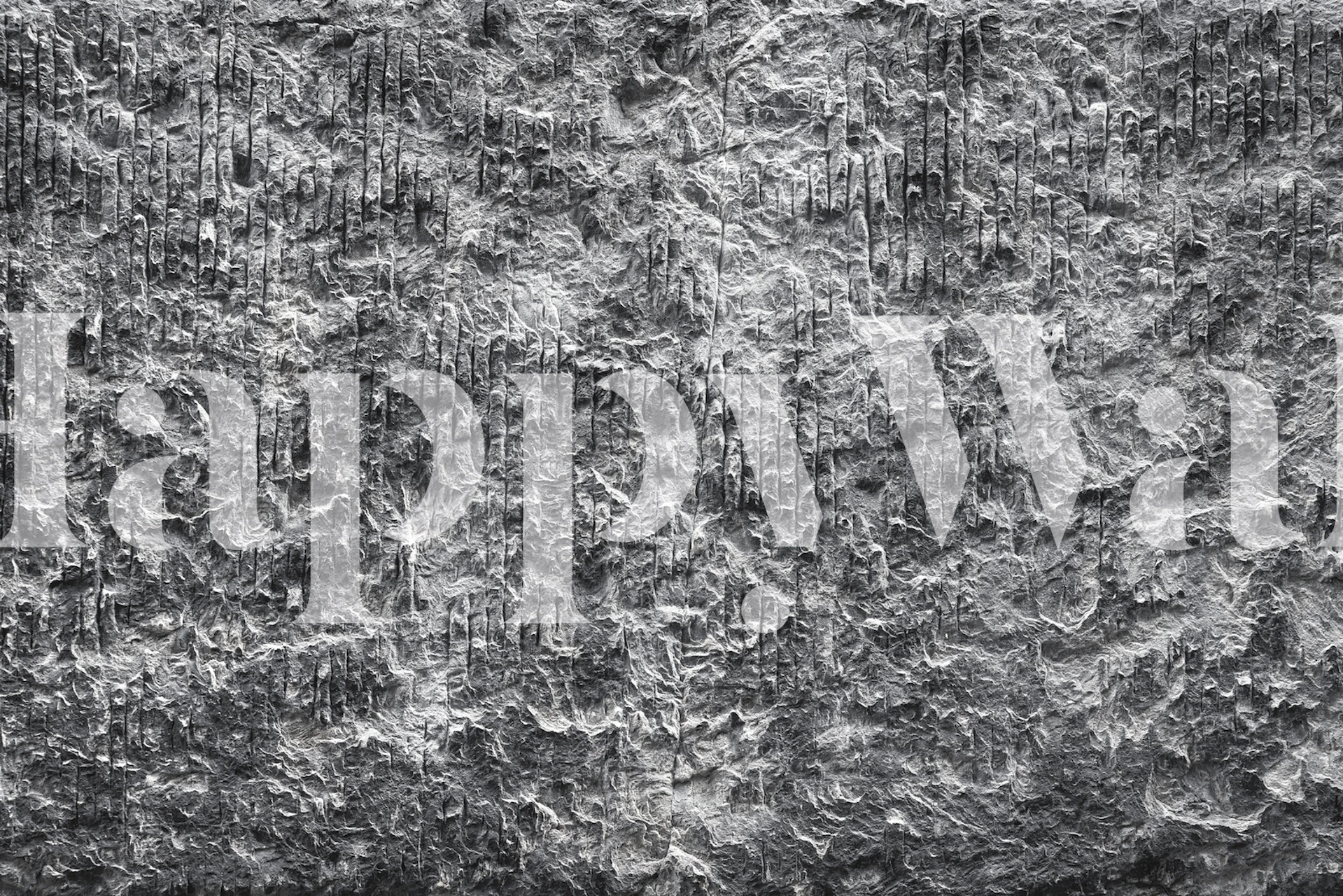 Textured gray stone wall wallpaper with a rugged surface