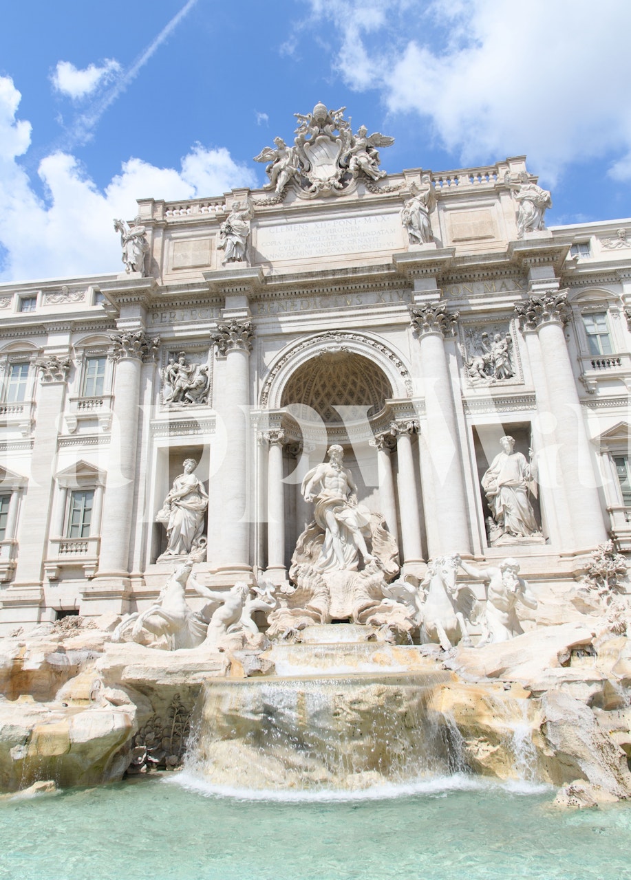 Trevi Fountain wall mural with classic architecture and blue sky