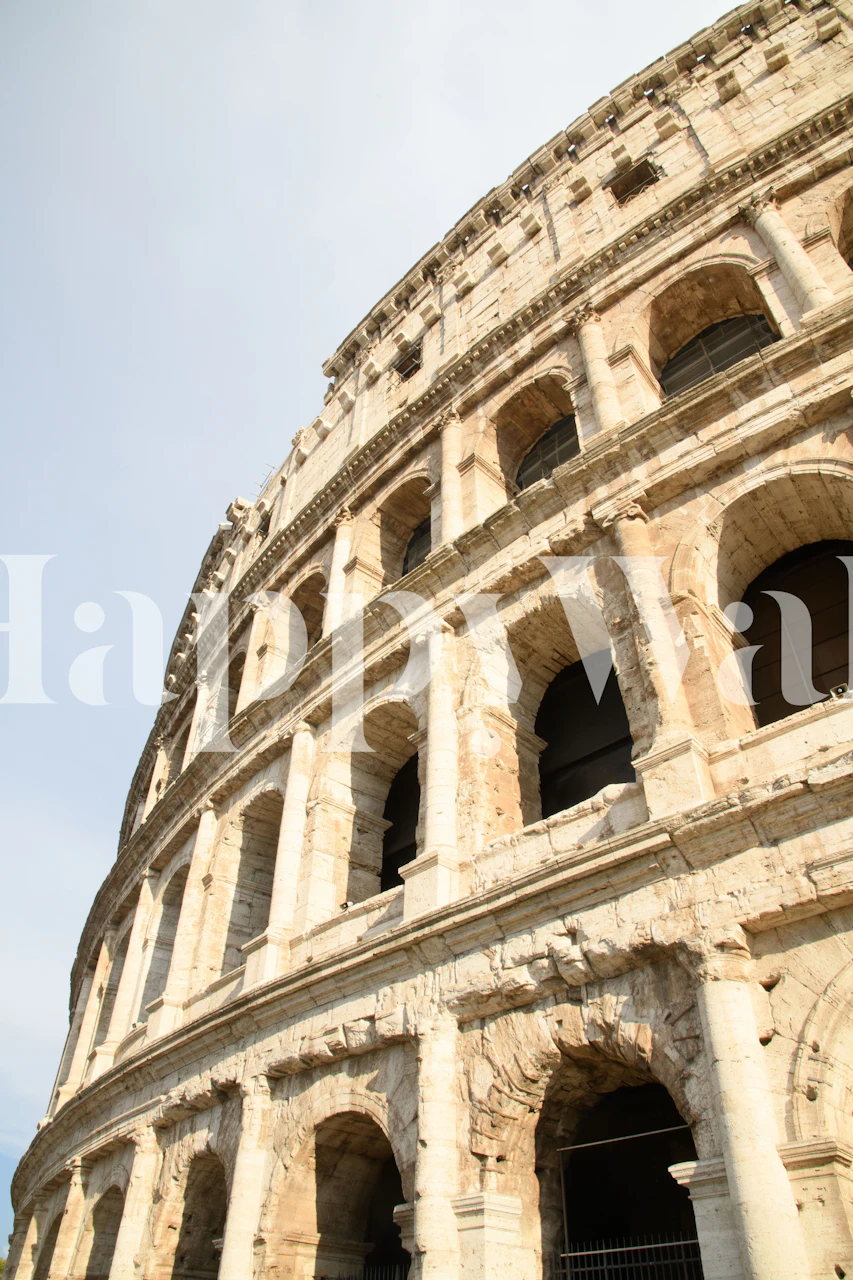Close-up view of the Colosseum's arches and structure in warm tones wallpaper
