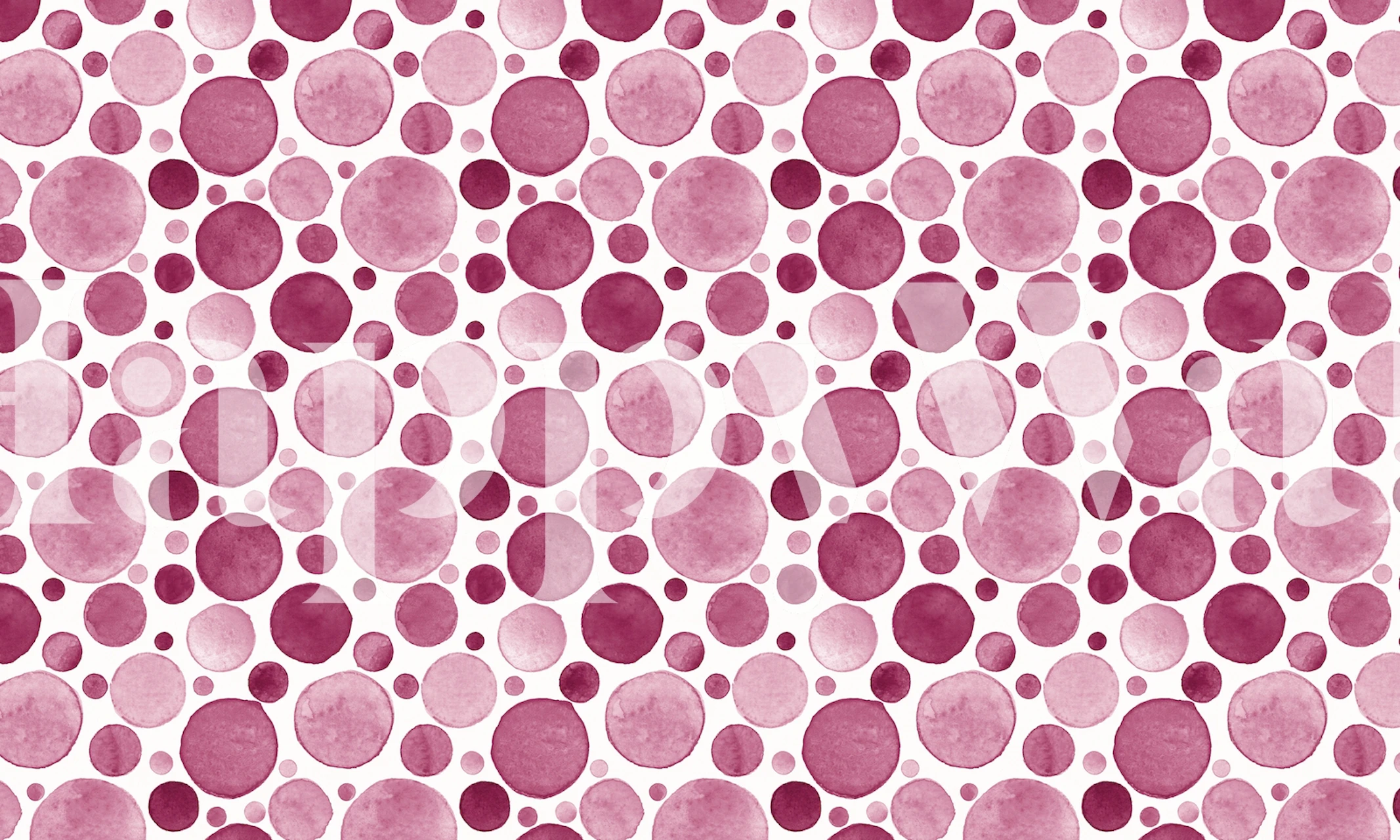 Watercolor circles in shades of pinks and reds on white background wallpaper
